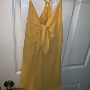 Forever 21 yellow tie front romper. WORN FEW TIMES